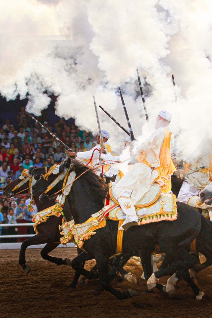 Traditional Moussem festival in Morocco featuring cultural celebrations, music, markets, and community gatherings